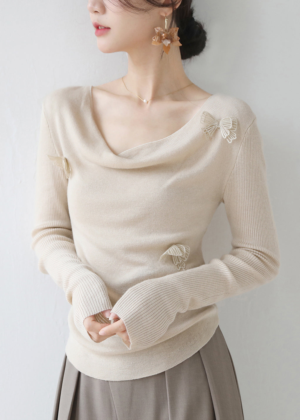 Haut en tricot ajusté à motif papillon abricot hiver RV022