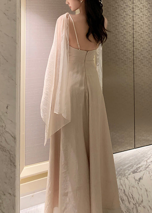 Robe longue d'été asymétrique en soie unie abricot élégante
