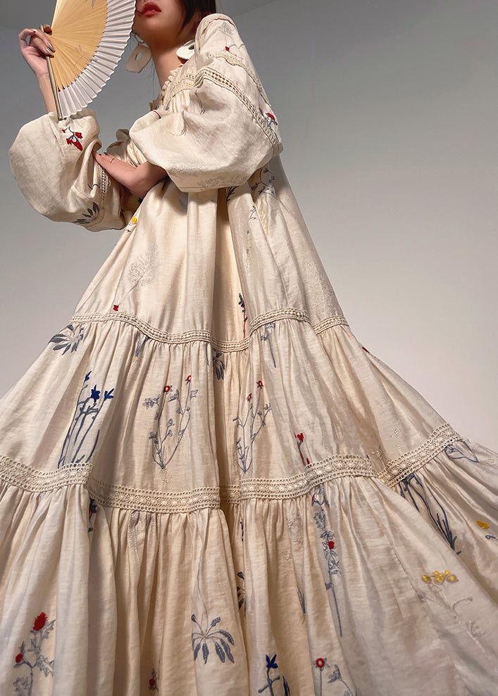 Lockeres, beiges Leinenkleid mit bestickten Rüschentaschen und langen Ärmeln AJ1033