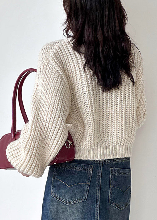 Beigefarbene Strickjacke aus Baumwolle mit Rundhalsausschnitt und langen Ärmeln AF1035