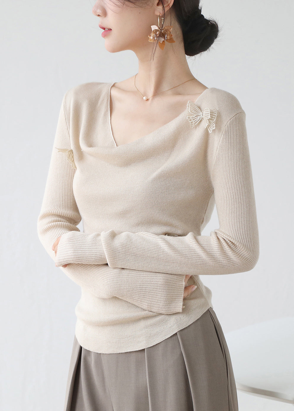 Haut en tricot ajusté à motif papillon abricot hiver RV022