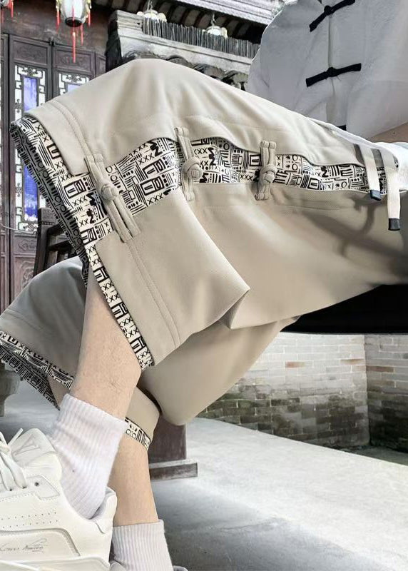 Pantalon patchwork en coton court d'été beige imprimé boutonné pour homme