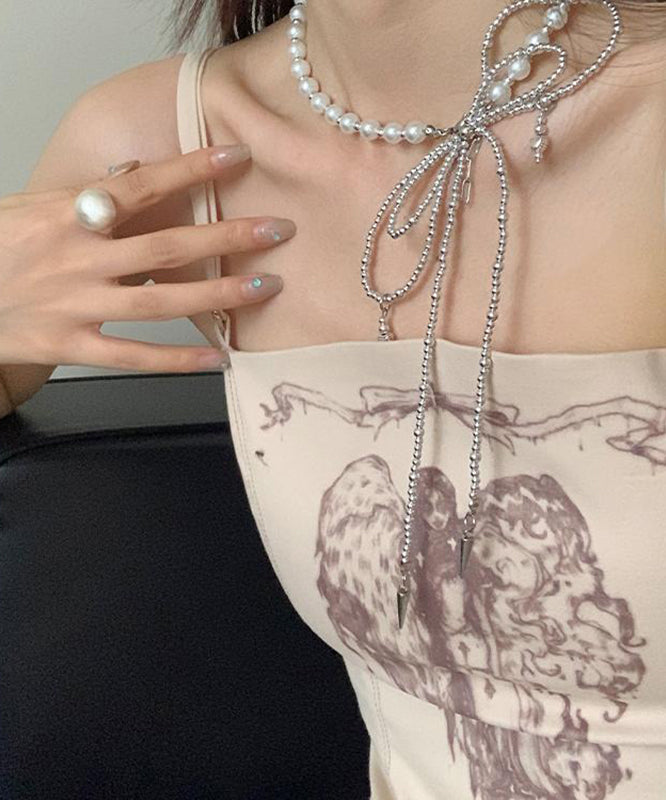 Halskette mit Anhänger aus Kunstseide-Edelstahl mit Perlen und Fliege aus Lac YA017