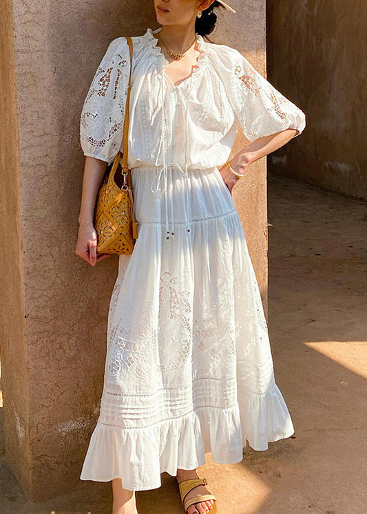 Deux jupes en coton à volants et pièces creuses blanches