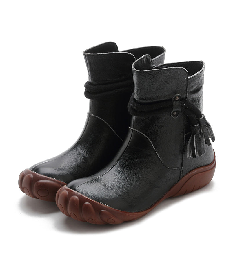 Bottes noires à pompons en cuir de vachette épissées, style rétro et confortable