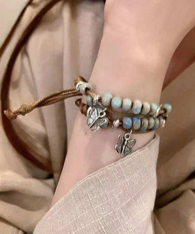 Ensemble de deux bracelets à breloques papillon en céramique tissée en alliage décontracté TX044