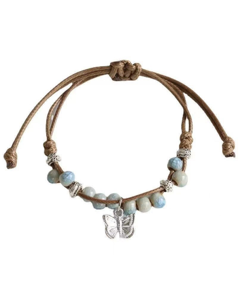 Ensemble de deux bracelets à breloques papillon en céramique tissée en alliage décontracté TX044