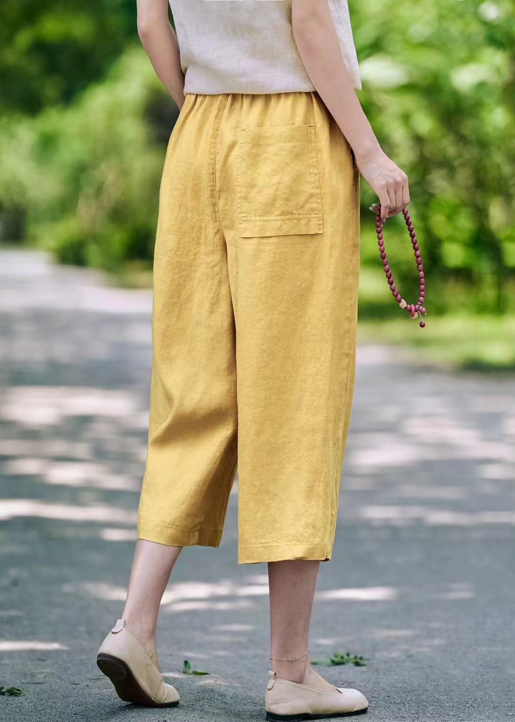 Pantalon court décontracté d'été à taille élastique et poches en lin