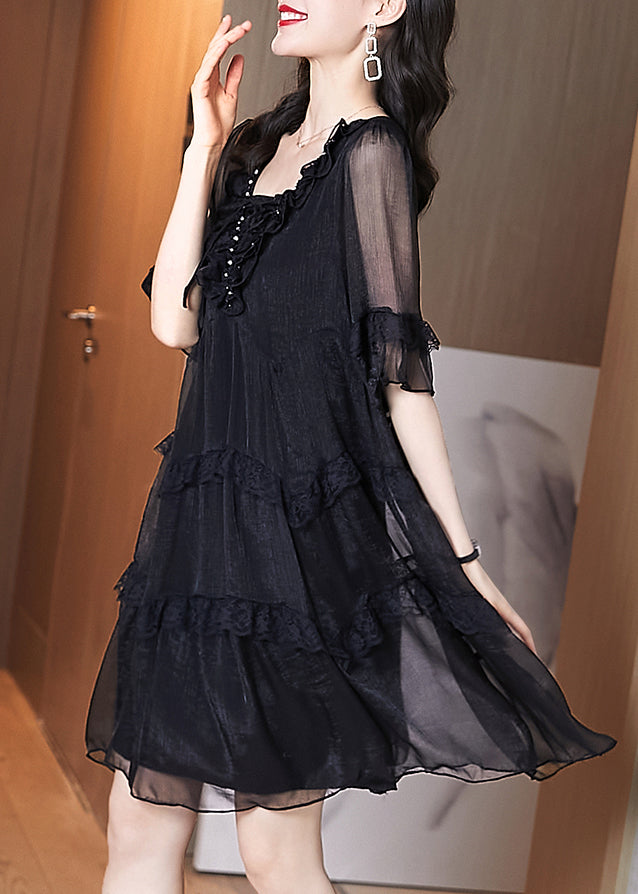 Schickes schwarzes Chiffon-Patchwork-Kleid mit Rüschen