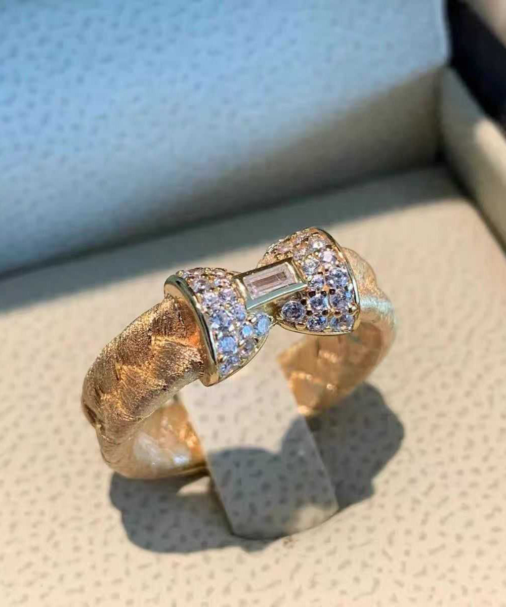 Schicke, vergoldete Ringe aus Sterlingsilber mit eingelegtem Zirkonia, Schleife, QI057