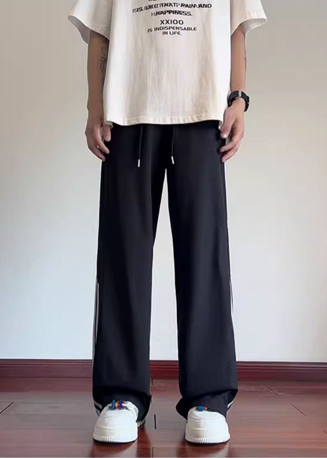 Pantalon noir élégant de printemps surdimensionné en coton rayé pour homme