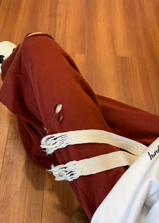 Pantalon long rouge déchiré pour homme, surdimensionné et creux, idéal pour le printemps