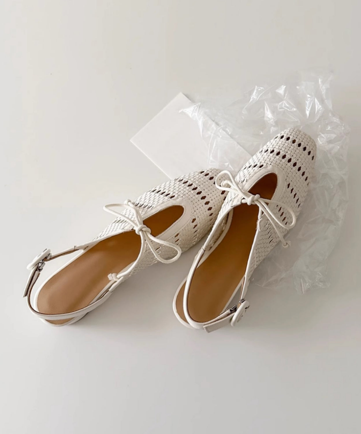 Sandales en peau de mouton française beige avec nœud et épissure creuse