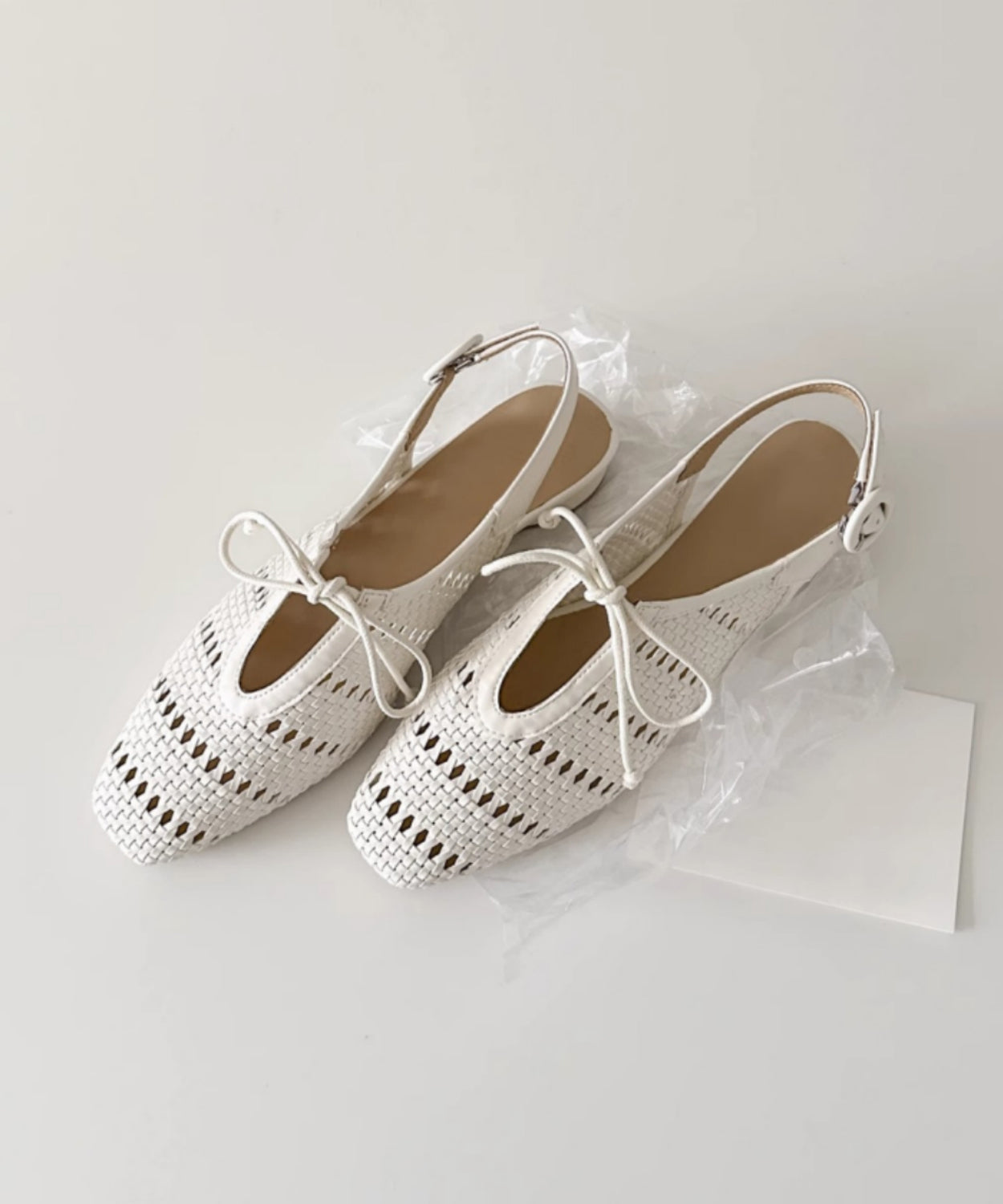 Sandales en peau de mouton française beige avec nœud et épissure creuse