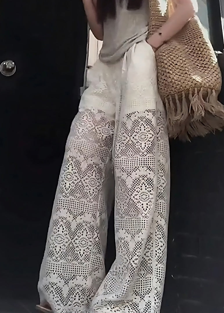 Französische weiße ausgehöhlte Taschen elastische Taille Spitzenhose Sommer AB1012