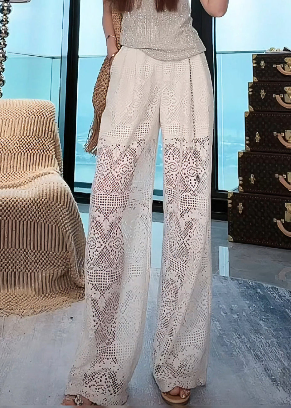 Französische weiße ausgehöhlte Taschen elastische Taille Spitzenhose Sommer AB1012