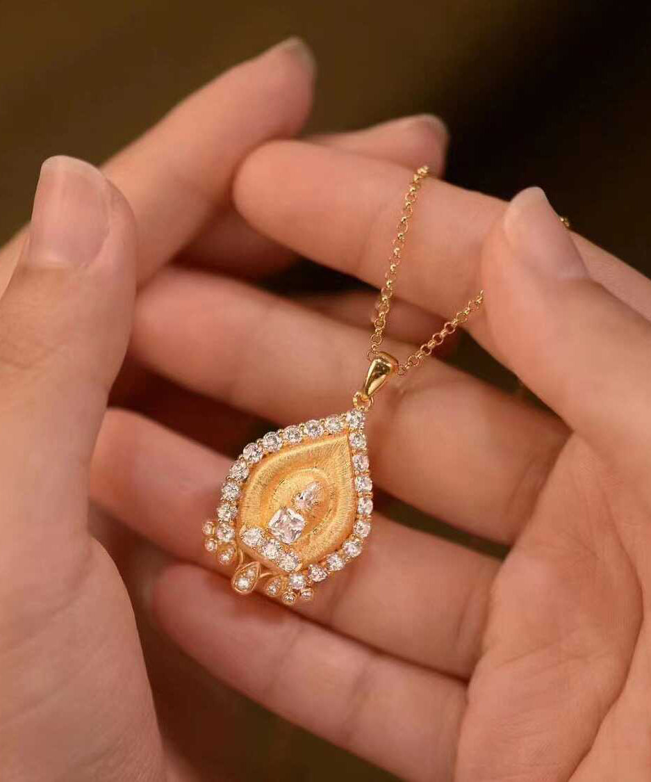Halskette mit Anhänger aus vergoldetem Sterlingsilber mit Zirkonia QI059