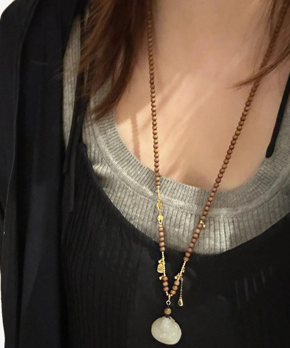 Handgemachte Halskette mit Anhänger aus braunem Sterlingsilber mit Sandelholzperlen YI040