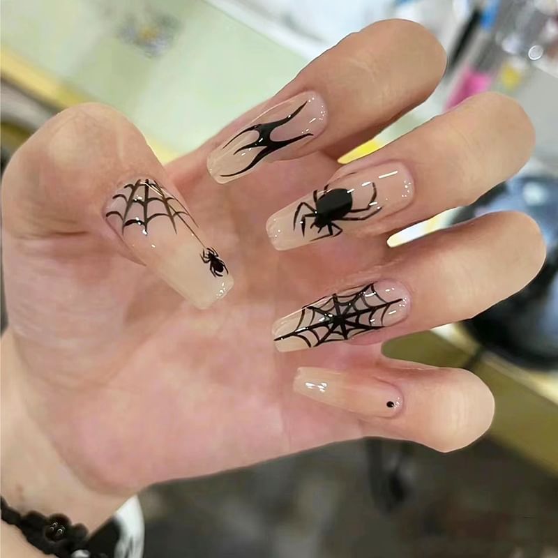 Ongles à pression en forme d'araignée