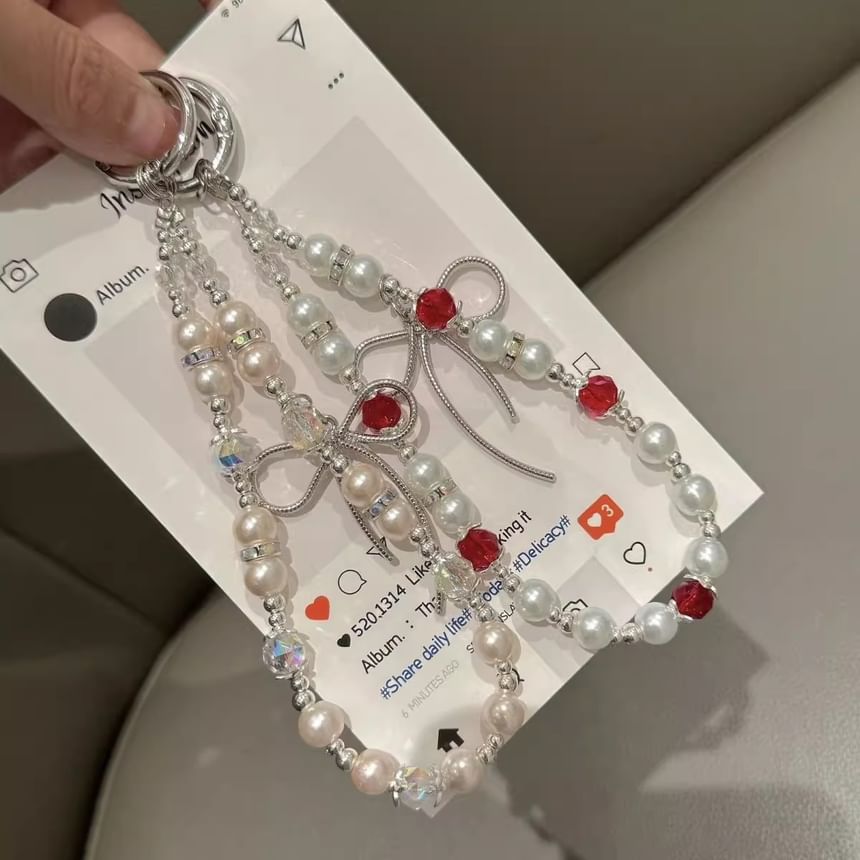 Bow Faux Pad Phone Lanyard with Pearl Strap