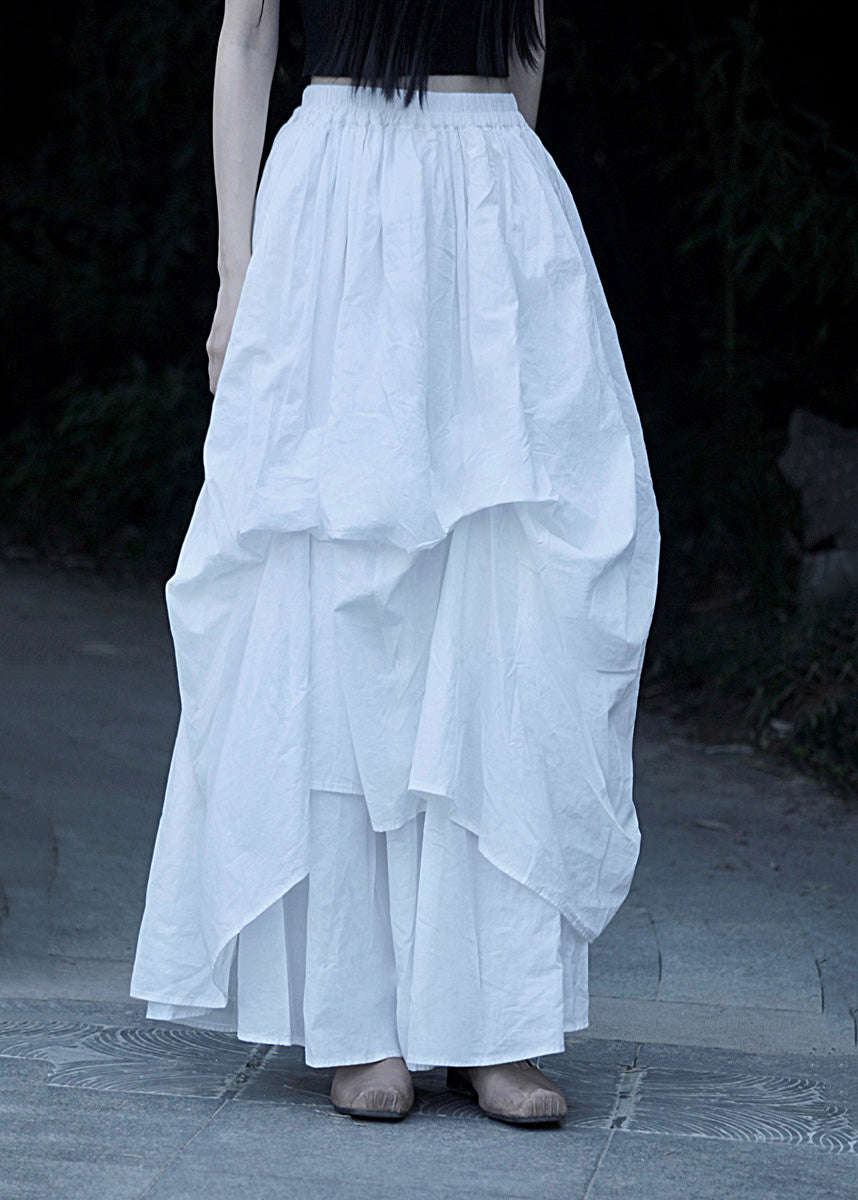 Lockerer schwarzer asymmetrischer faltiger Baumwollrock mit elastischer Taille für den Sommer LK005