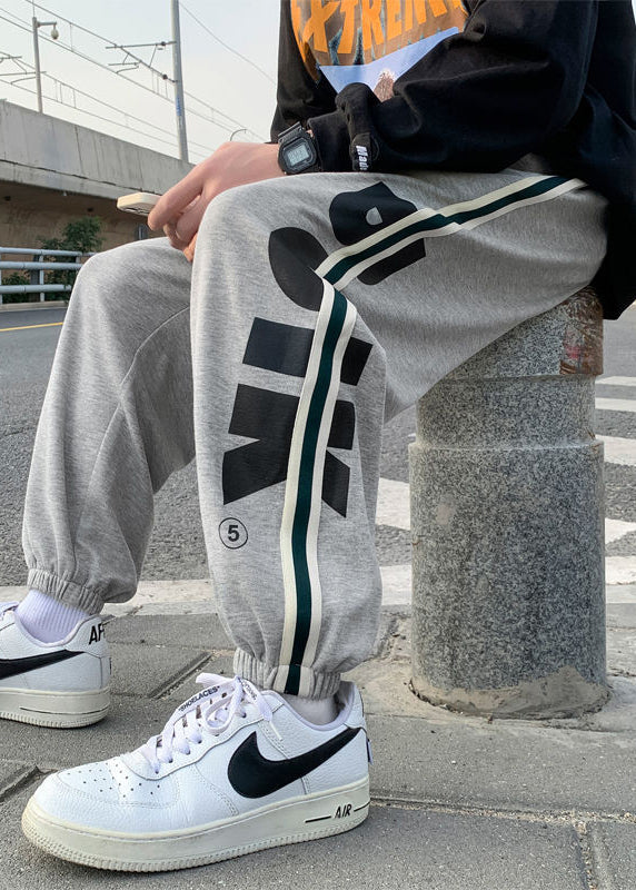 Lockere Baumwollhose mit grünem Aufdruck und elastischer Taille für Herren im Herbst WA056