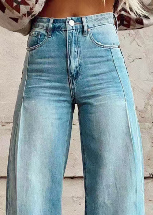 Pantalon ample taille haute en denim bleu avec poches à boutons légers