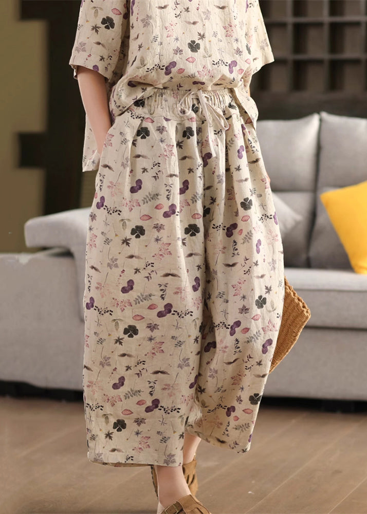 Lockere Leinenhose mit Kordelzug und Sommerprint in Lila