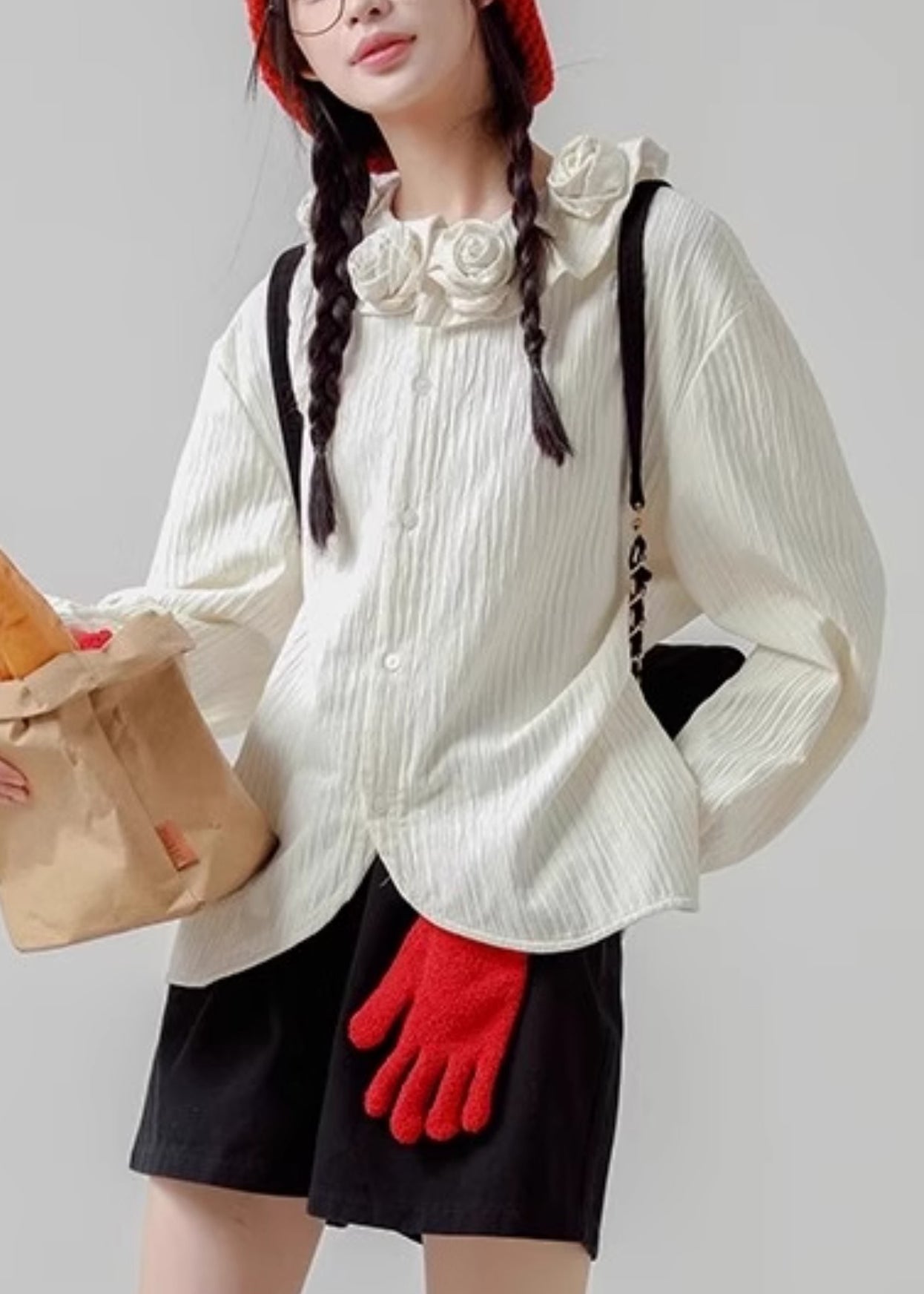 Chemise ample en coton à boutons blancs et imprimé floral