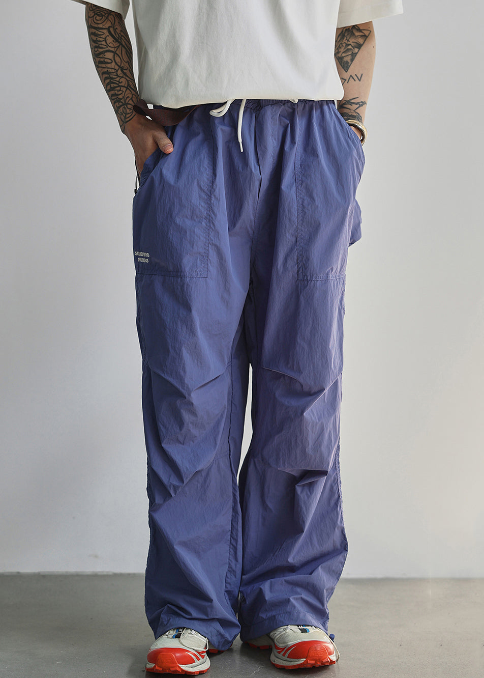 Pantalon d'été bleu en coton avec lettres et poches pour homme