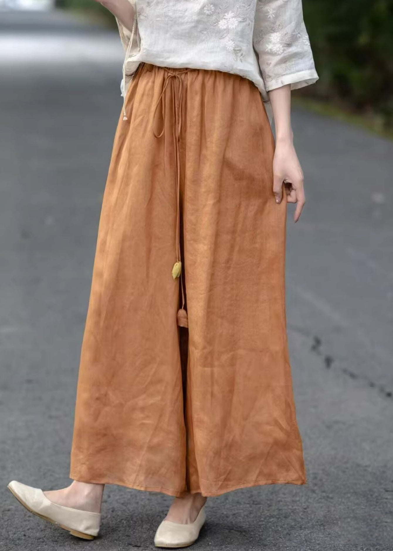Pantalon court en coton élastique uni orange avec poches et taille haute pour l'été