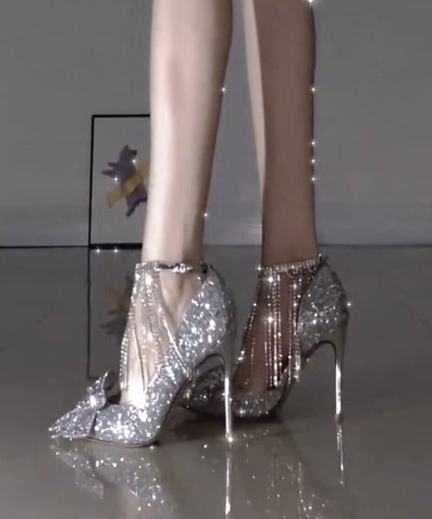 Talons aiguilles à nœud argenté et pompon en zircon TP002
