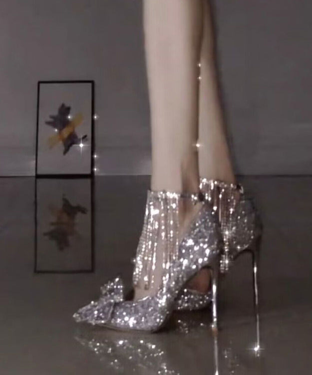 Talons aiguilles à nœud argenté et pompon en zircon TP002