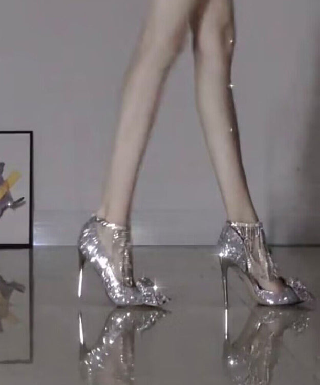 Talons aiguilles à nœud argenté et pompon en zircon TP002