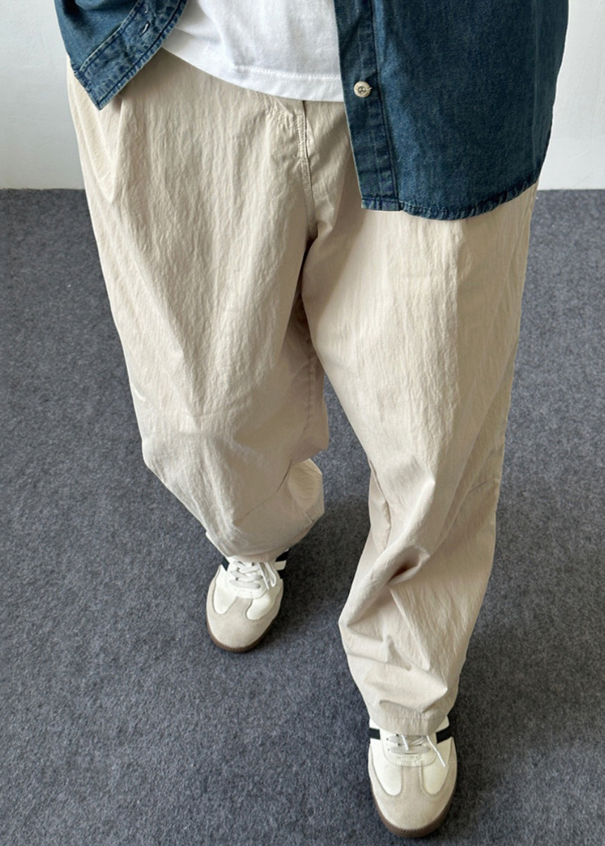 Pantalon d'été en coton avec poches boutonnées pour homme, simple et uni, beige