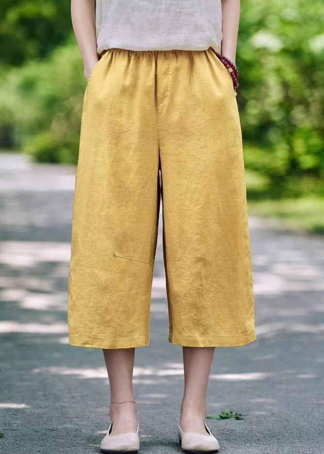 Pantalon d'été court en lin blanc avec poches simples et élastiques