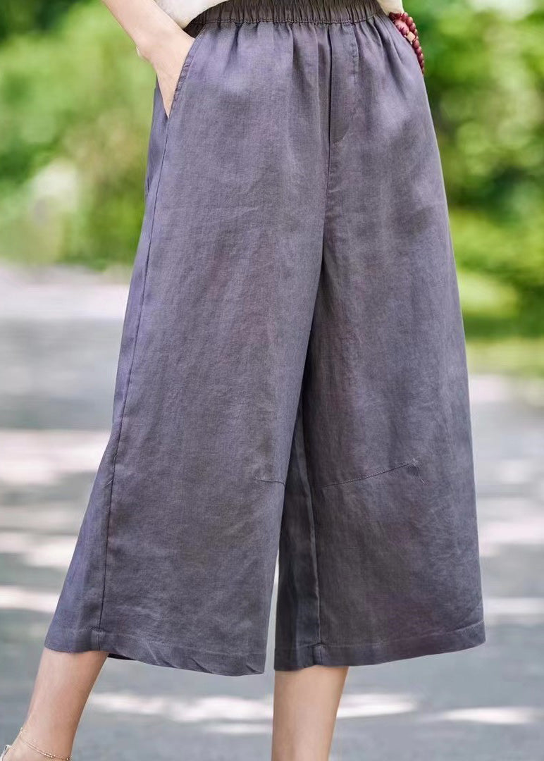 Pantalon d'été court en lin blanc avec poches simples et élastiques