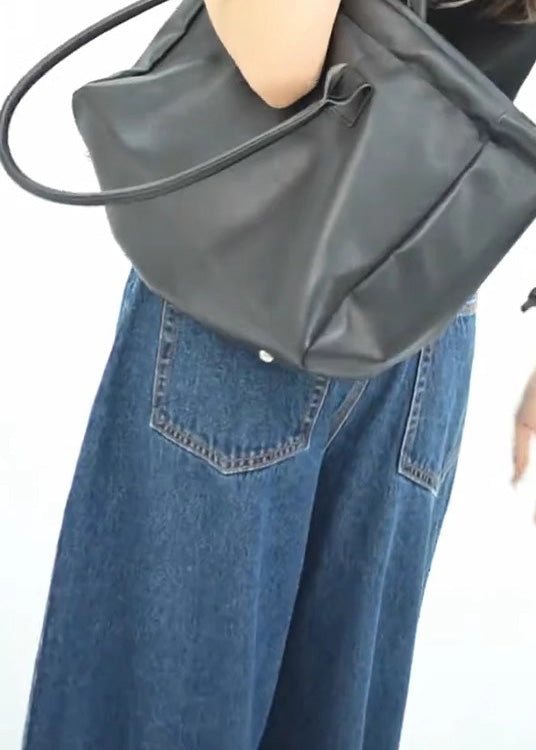 Pantalon large et élégant à jambes ouvertes sur le côté en denim bleu avec poches