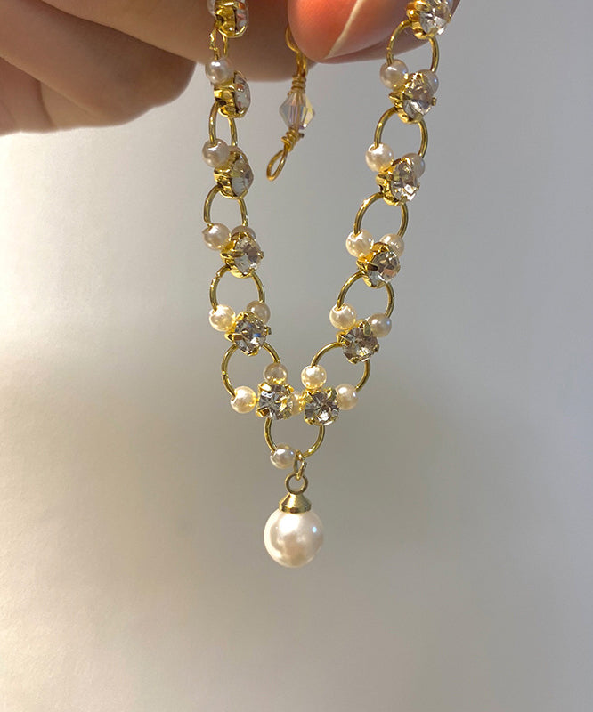 Stilvolles Charm-Armband aus Gold-Kupferlegierung mit Zirkonia-Perlen TX033