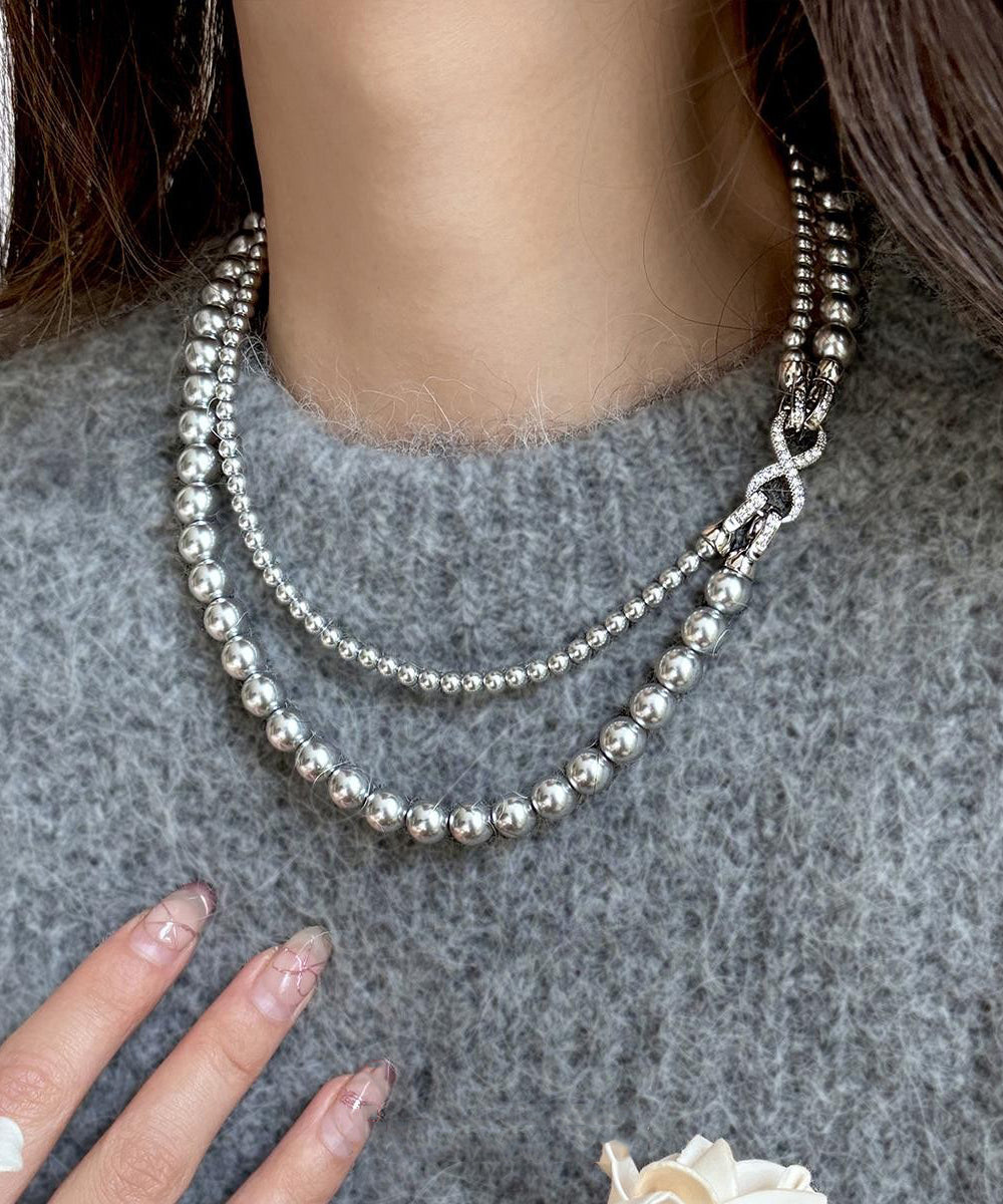 Collier élégant en alliage de métal blanc à double couche de perles ET011