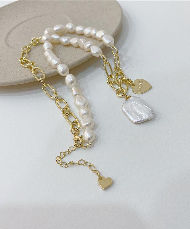 Collier unique avec pendentif en surdorure blanche et perle en cuivre asymétrique