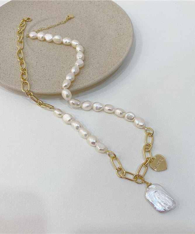 Collier unique avec pendentif en surdorure blanche et perle en cuivre asymétrique