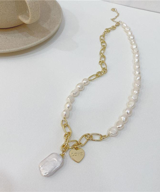 Collier unique avec pendentif en surdorure blanche et perle en cuivre asymétrique