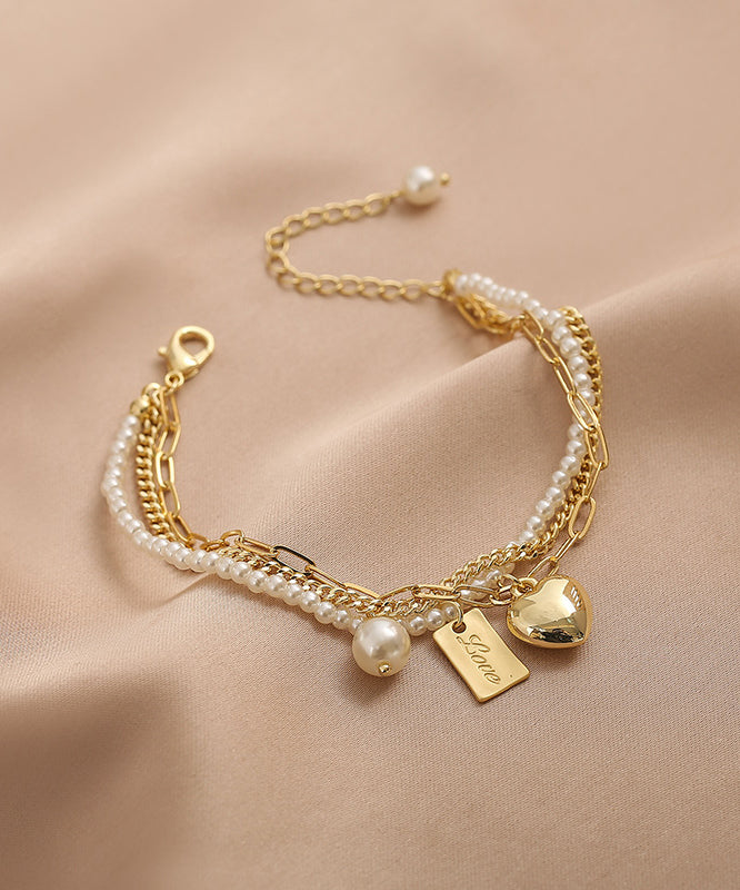 Vogue Gold Metalllegierung Perle Grafik Liebe Quaste Charm ArmbandFeine Seide Sterling Silber Gebrochen Silber Gypsophila Halskette ET008