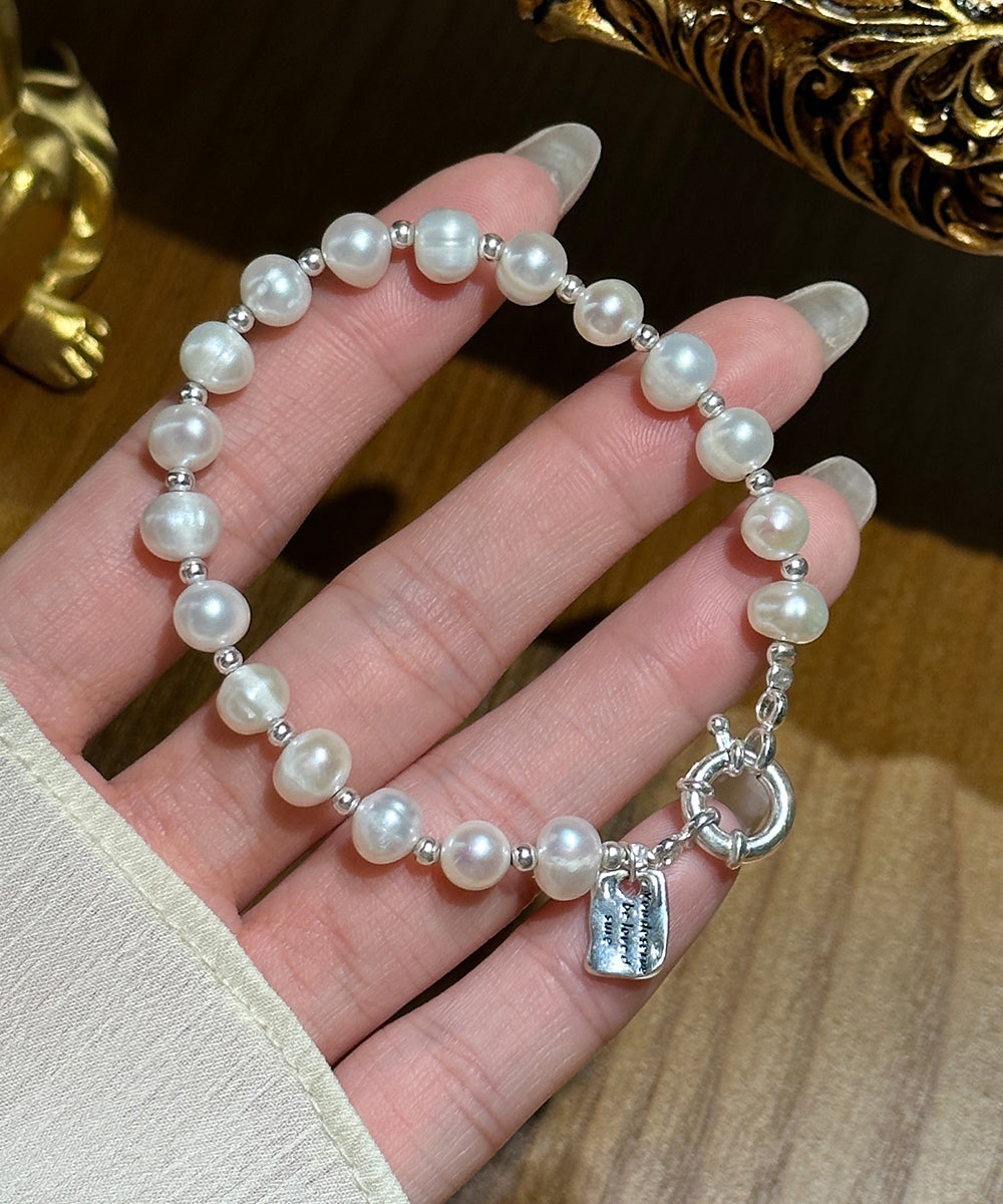 Vogue Charm-Armband aus weißem Sterlingsilber mit Perlen und grafischem Motiv WF006