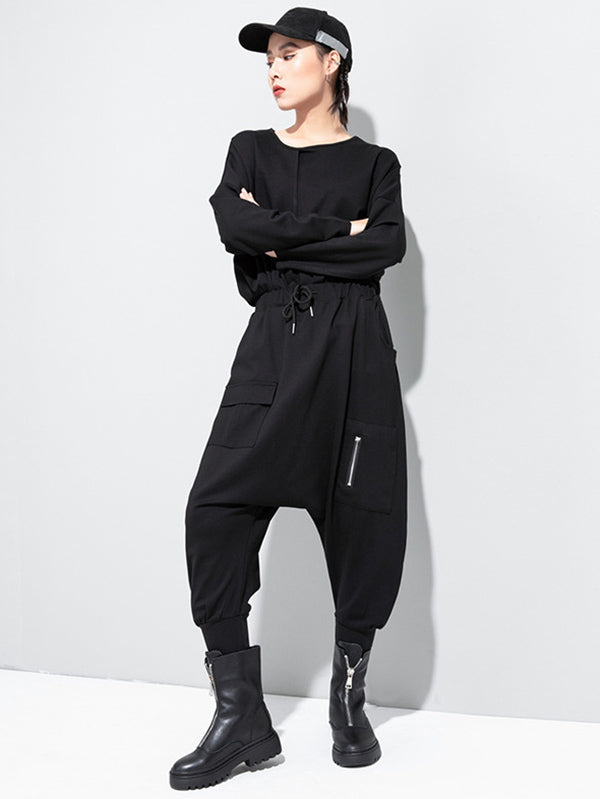 Pantalon sarouel simple noir avec poches à la taille et élasticité WS012