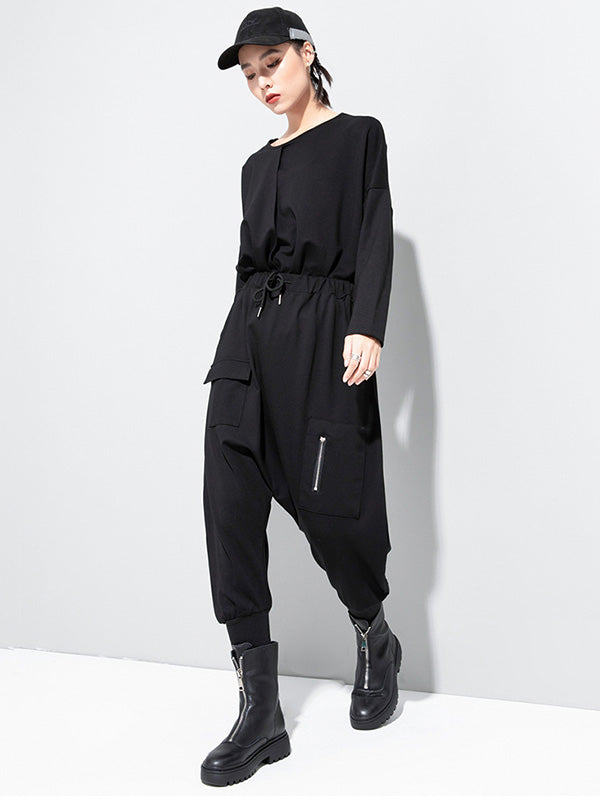 Pantalon sarouel simple noir avec poches à la taille et élasticité WS012