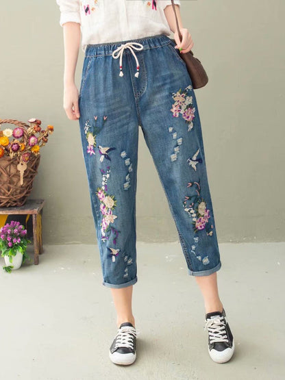 Pantalon sarouel décontracté d'été en denim avec broderie florale pour femme IO1022