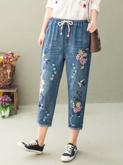 Pantalon sarouel décontracté d'été en denim avec broderie florale pour femme IO1022