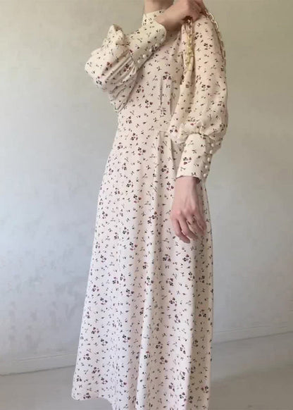 Robe en mousseline de soie imprimée à col montant et lacets abricot automne 2024 WO056